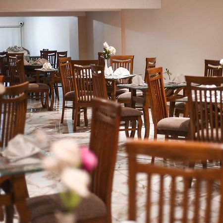Hotel Pearl Inn Karachi Bagian luar foto