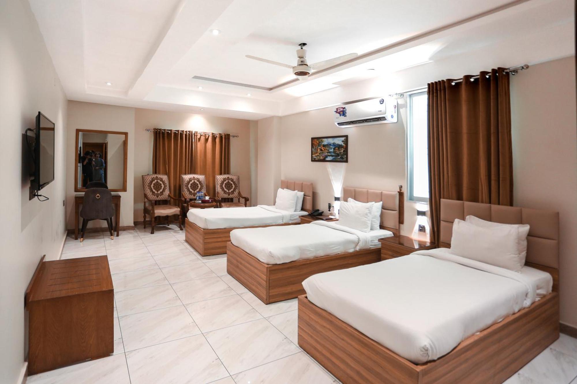 Hotel Pearl Inn Karachi Bagian luar foto